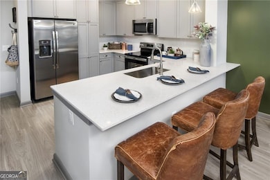 Kitchen featuring appliances with stainless steel 