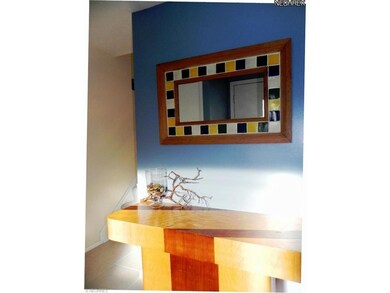 Welcoming light and bright foyer with newer, neutr