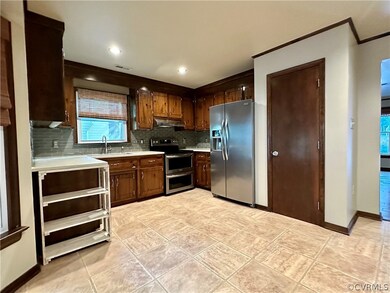 Kitchen with tile patterned flooring, pantry, tast