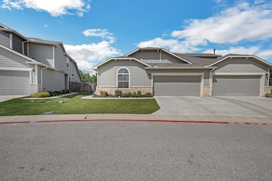 Craftsman-style house featuring an attached garag