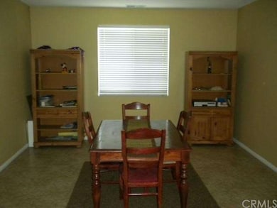 Nice size tiled dining area. 