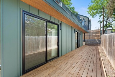 Wooden deck featuring fence