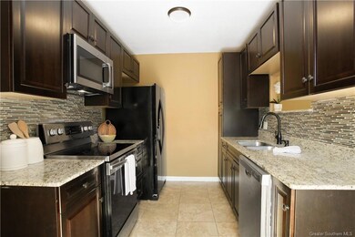Kitchen with granite countertops.