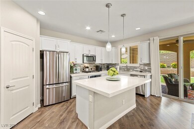 Kitchen featuring stainless steel appliances, tast