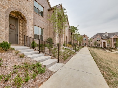 Property entrance featuring brick siding and a residential view