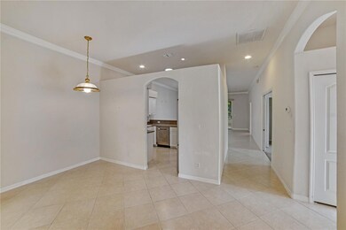 ENTER THROUGH FOYER TO DINING/FLEX ROOM ON RIGHT AND DEN AND GUEST ROOM AND BATH ON LEFT