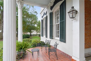 The windows of this unit overlook the front porch