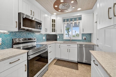 4 Westwood Ave unit 205H, Jupiter, FL 33469 - photo 2