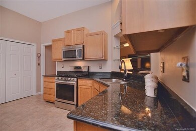 A view of the Kitchen from the Dining Room.
