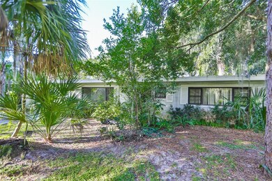Front of home including side driveway for parking