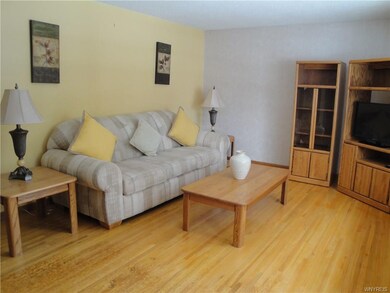 Spacious Living Room with Hardwood Floors