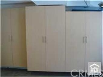 Built in custom cabinets throughout garage