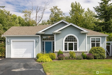 This unit is just the second one in the development and abuts the creek behind which is filed with nature.