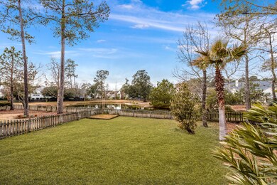 View of pond and backyard