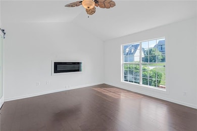 Master Bedroom featuring ceiling fan, lofted ceili
