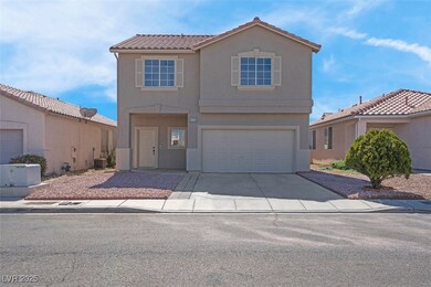 View of front of home featuring an attached garage