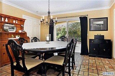VIEW OF FORMAL DINING ROOM FROM KITCHEN LOOKING TO