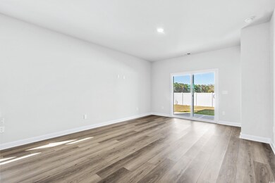 Spare room with light hardwood / wood-style floors