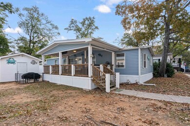 View of front of home featuring covered porch and 