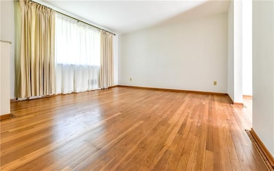 View of the living room as you walk down the hall 