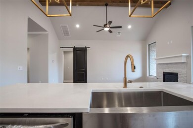 Kitchen featuring stainless steel dishwasher, ceil