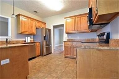 THE KITCHEN IS JUST A FEW STEPS FROM THE DINING RO