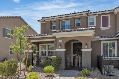 Multi unit property with a tile roof, stucco sidin