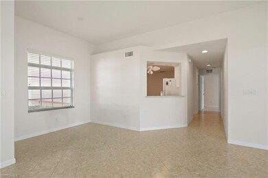 Unfurnished room featuring baseboards and recessed
