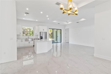 1081 Desoto Blvd S, Naples, FL 34117 - photo 2