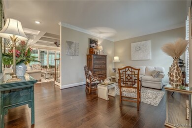 The Formal Living Room features crown molding and