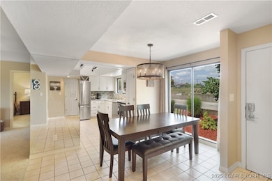 24 E Casa Del Rio Dr unit 689, Lake Ozark, MO 65049 - photo 6