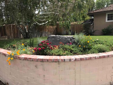 View of fenced backyard