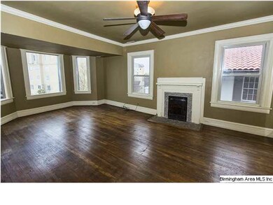 Master bedroom with views, fireplace and hardwood 
