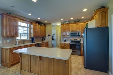 Stainless steel appliances and recessed lighting in the kitchen as well! 