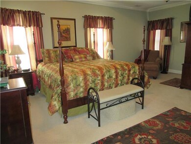 Master bedroom is a fabulous retreat! Oversized with sitting area! Large trey ceiling.