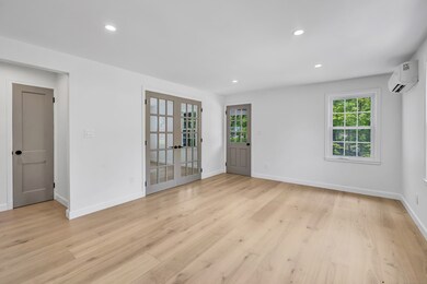 New recessed lighting and hardwood floors