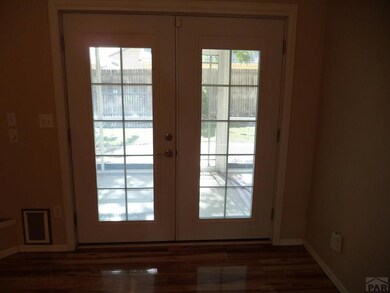 French doors off living room to back yard