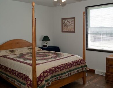 Master Bedroom. New rustic wood laminate flooring,