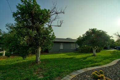 Front of house from East side Two mature
