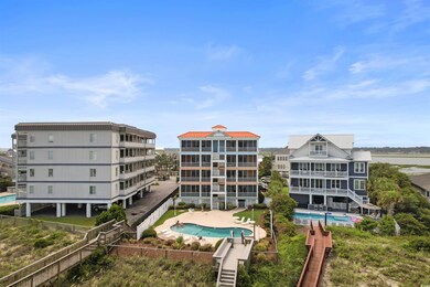 View of property with a community pool