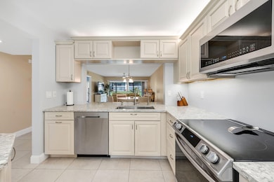 236 Pebble Beach Cir unit 102, Naples, FL 34113 - photo 6