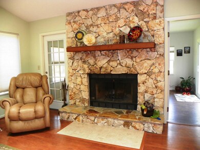 Family Room with Woodburning Fireplace