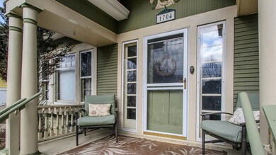 Relax on your historic front porch