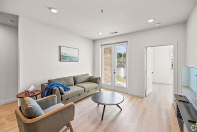 Living room featuring light wood-type flooring and