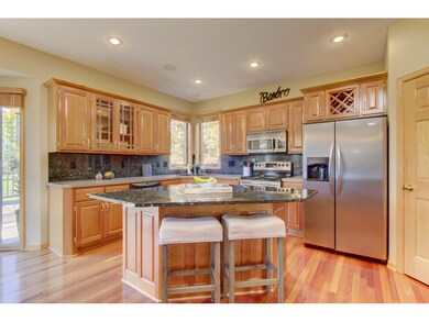 Gorgeous kitchen with granite on island and backsp