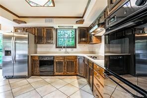 STEP SAVING KITCHEN FEATURES NEWER SS SIDE BY SIDE FRIDGE, DISHWASHER, ELECTRIC COOKTOP AND DOUBLE OVENS FOR THE HOLIDAY BAKING. CORIAN COUNTERS ..............