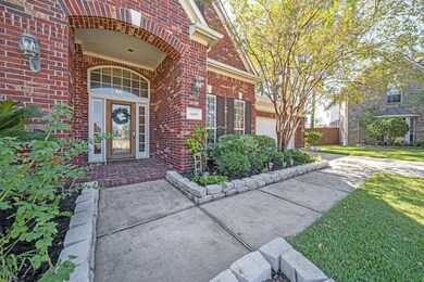 A gorgeous oversized front porch waiting for your seasonal decor.