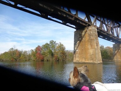 Here we are approaching Statesville Brick. water connectivity to Lake Norman is so easy. It took 40 minutes to arrive by boat when you leave Cornelius. Point is Beautiful Water can accommodate large boats, this is not a stream or cove.
