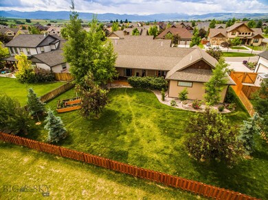 Fenced Backyard with garden area, and huge covered