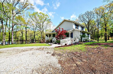 Front of home with lake view